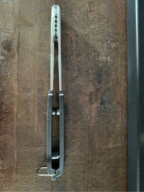 The Pampered Chef Stainless Steel and Black Locking Tongs